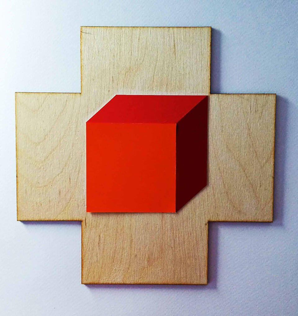 Paper collage on wood base